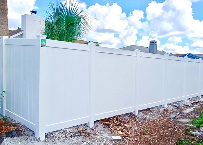 White Vinyl Privacy Fence · Clean & Durable